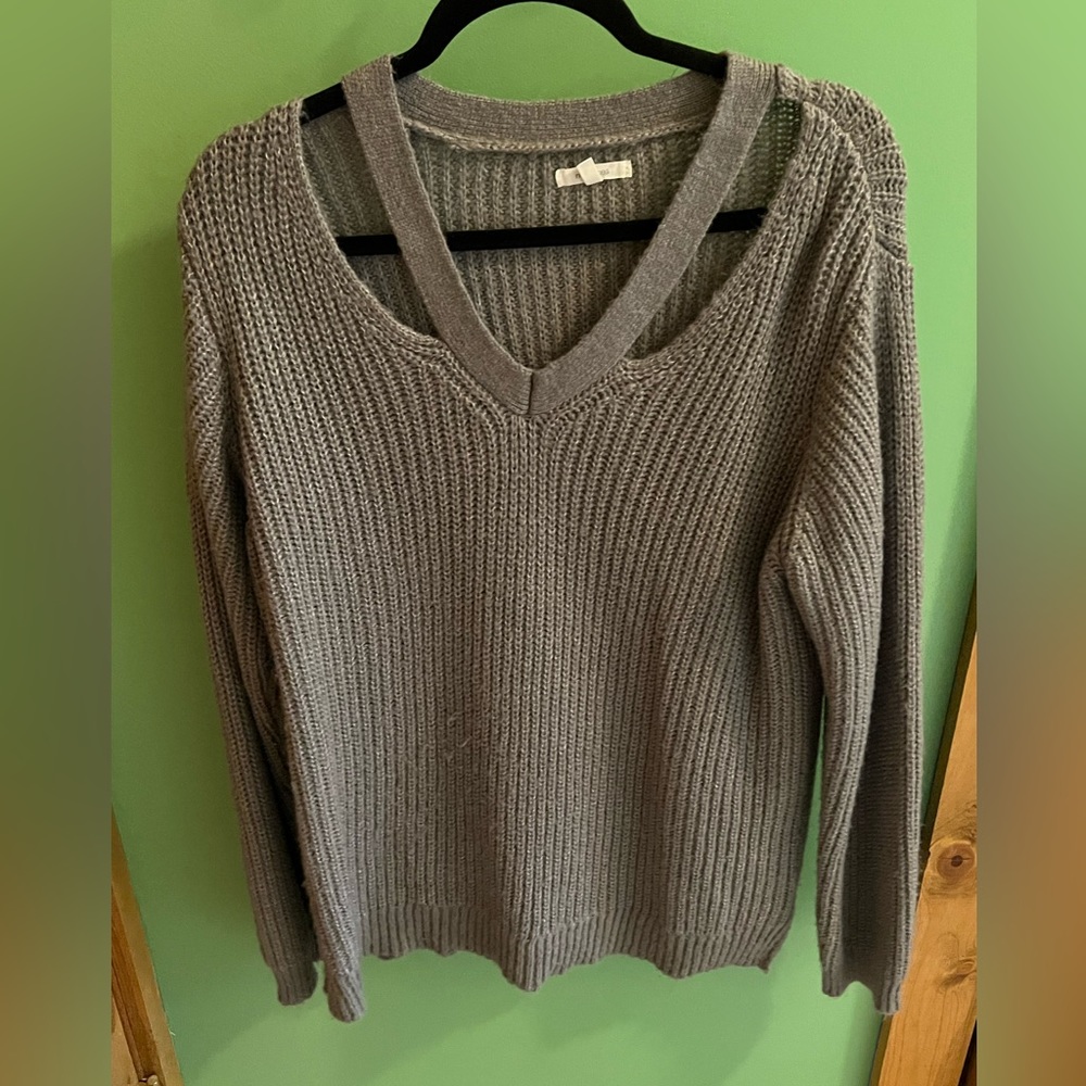 Maurice’s knit sweater with cutouts. Grey